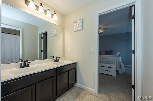 151 Wilmer Valley Dr, Wentzville, MO 63385 - full bath featuring double vanity, baseboards, and a ceiling fan