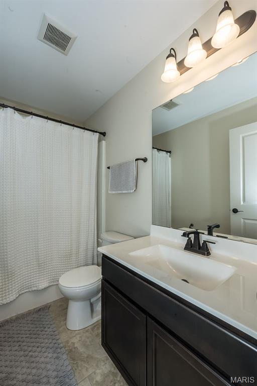 151 Wilmer Valley Dr, Wentzville, MO 63385 - full bath featuring toilet and vanity