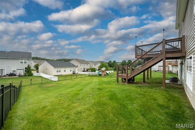 151 Wilmer Valley Dr, Wentzville, MO 63385 - view of yard featuring a playground, stairway, a residential view, and a deck