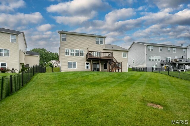 151 Wilmer Valley Dr, Wentzville, MO 63385 - back of house with stairway, a wooden deck, and a residential view