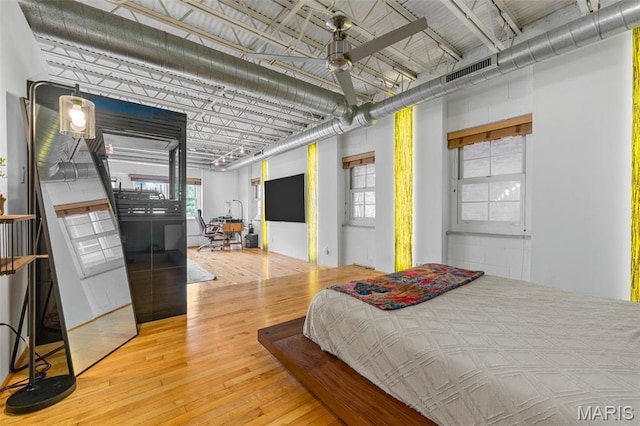 2401 S 12th St Unit 101, Saint Louis, MO 63104 - bedroom with hardwood / wood-style flooring