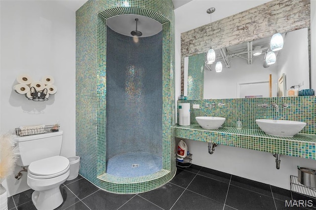 2401 S 12th St Unit 101, Saint Louis, MO 63104 - full bath featuring toilet, a stall shower, tile patterned floors, and tile walls