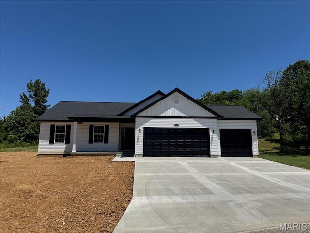 2988 Scott Rd, Moscow Mills, MO 63362 - view of front of property with an attached garage and driveway