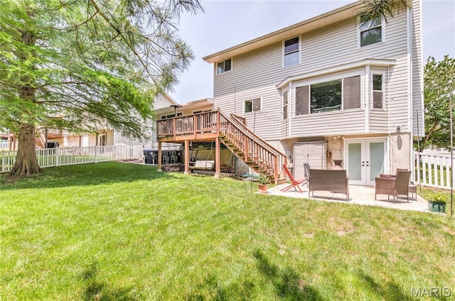 10 Forest Pine Ct, Ofallon, MO 63368 - rear view of property with stairway, a fenced backyard, a wooden deck, a patio, and french doors