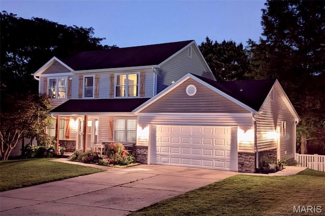 10 Forest Pine Ct, Ofallon, MO 63368 - view of front of property featuring stone siding, concrete driveway, and a garage