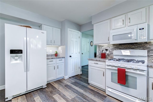 10 Forest Pine Ct, Ofallon, MO 63368 - kitchen with white appliances, dark wood-type flooring, white cabinets, and decorative backsplash