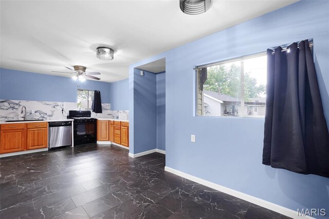508 Prince Ruppert Dr, Ofallon, MO 63366 - kitchen with dishwasher, black gas stove, a sink, light countertops, and ceiling fan