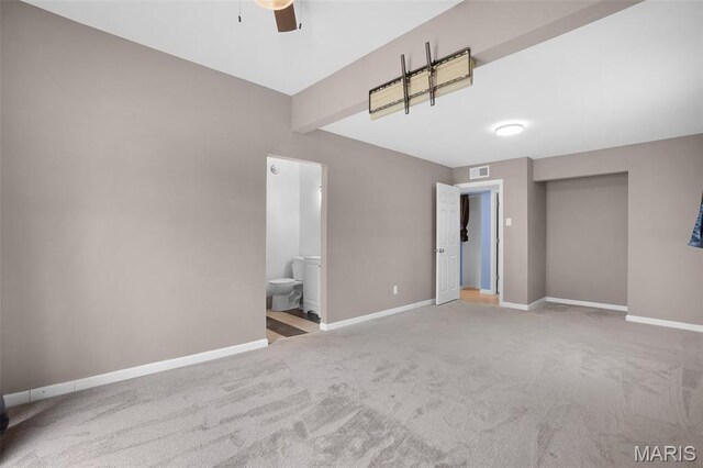 508 Prince Ruppert Dr, Ofallon, MO 63366 - unfurnished bedroom with carpet floors, baseboards, and ensuite bathroom