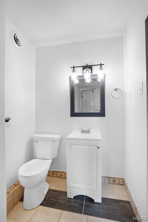 508 Prince Ruppert Dr, Ofallon, MO 63366 - bathroom featuring vanity, toilet, and tile patterned floors