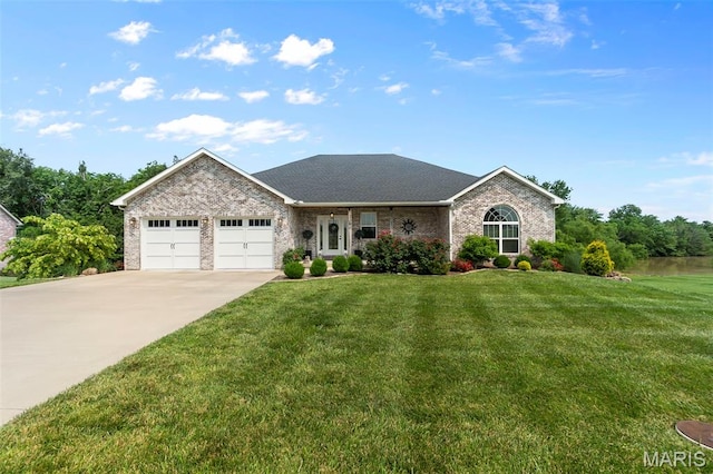 2291 Cambridge, Jackson, MO 63755 - ranch-style home featuring an attached garage, concrete driveway, a front yard, and brick siding