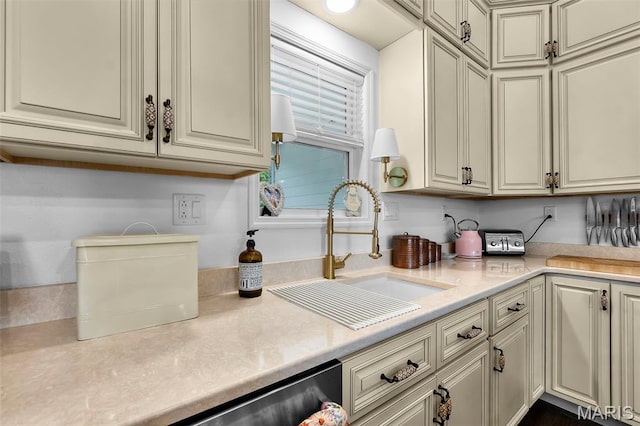 2291 Cambridge, Jackson, MO 63755 - kitchen with a sink, light countertops, cream cabinetry, and dishwasher