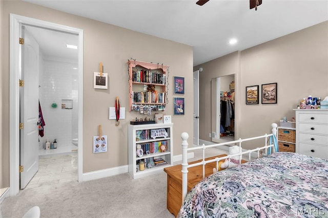 2291 Cambridge, Jackson, MO 63755 - bedroom featuring a walk in closet, baseboards, ensuite bathroom, a closet, and ceiling fan