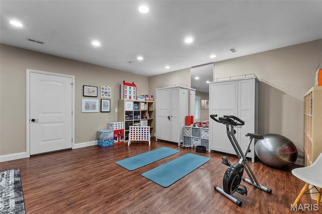 2291 Cambridge, Jackson, MO 63755 - workout room with wood finished floors, recessed lighting, and baseboards