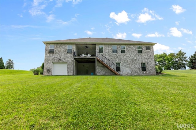 2291 Cambridge, Jackson, MO 63755 - rear view of property featuring stairs, a ceiling fan, a yard, brick siding, and a garage
