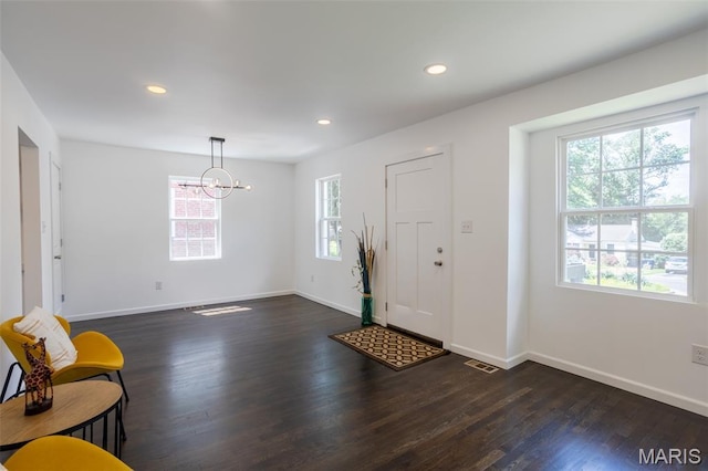 702 Crompton Ct, Saint Louis, MO 63126 - foyer entrance featuring a chandelier, dark wood finished floors, and recessed lighting