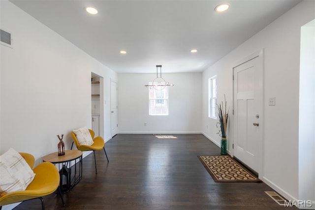 702 Crompton Ct, Saint Louis, MO 63126 - foyer entrance with recessed lighting, dark wood-type flooring, and a chandelier