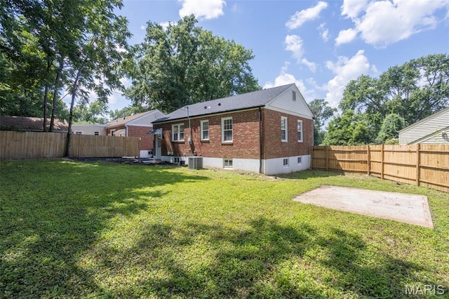 702 Crompton Ct, Saint Louis, MO 63126 - back of house featuring brick siding, a fenced backyard, and a patio