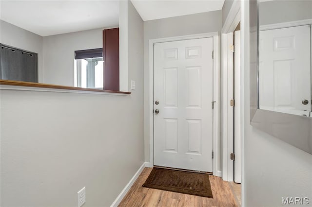 220 Preserve Park Pl, Wentzville, MO 63385 - entryway featuring light wood-style flooring and baseboards