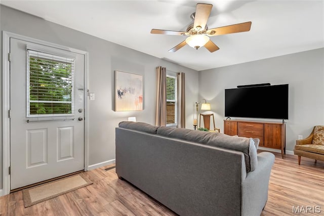 220 Preserve Park Pl, Wentzville, MO 63385 - living area with light wood-type flooring and a ceiling fan