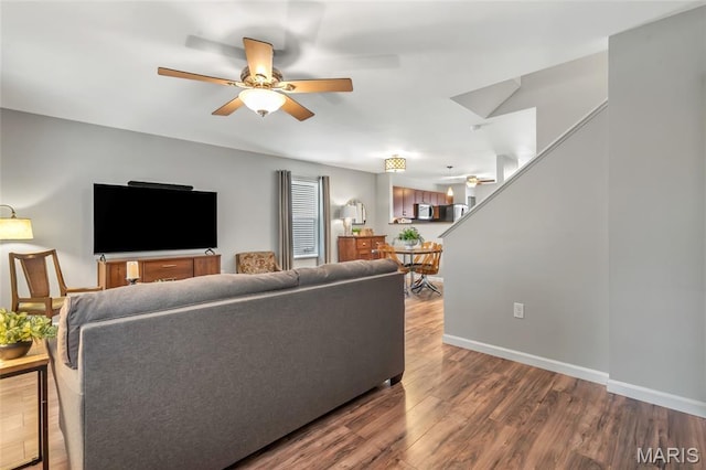 220 Preserve Park Pl, Wentzville, MO 63385 - living area with a ceiling fan, wood finished floors, and stairs