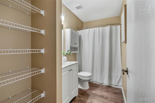 220 Preserve Park Pl, Wentzville, MO 63385 - bathroom featuring wood finished floors, vanity, and a shower with curtain