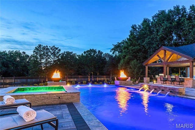 5425 Independence Rd, Weldon Spring, MO 63304 - view of swimming pool with a fire pit, an in-ground hot tub, a gazebo, and a fenced backyard