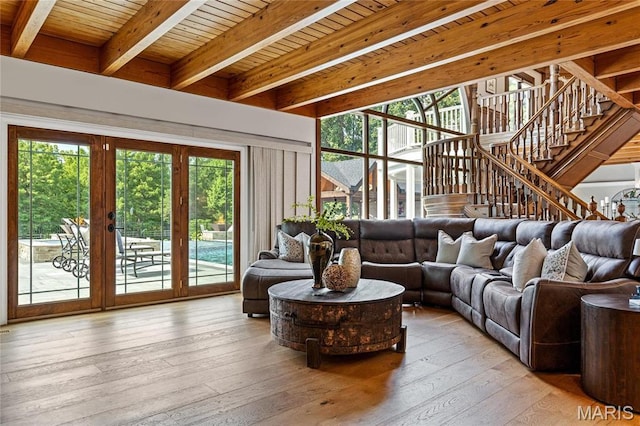 5425 Independence Rd, Weldon Spring, MO 63304 - living room featuring wooden ceiling with exposed beams, hardwood / wood-style flooring, stairway, and french doors
