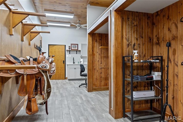 5425 Independence Rd, Weldon Spring, MO 63304 - home office featuring wood finished floors, wood walls, ceiling fan, a sink, and wooden ceiling