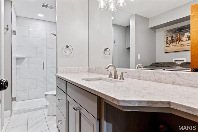 5425 Independence Rd, Weldon Spring, MO 63304 - bathroom with marble look tile flooring, vanity, a stall shower, toilet, and recessed lighting