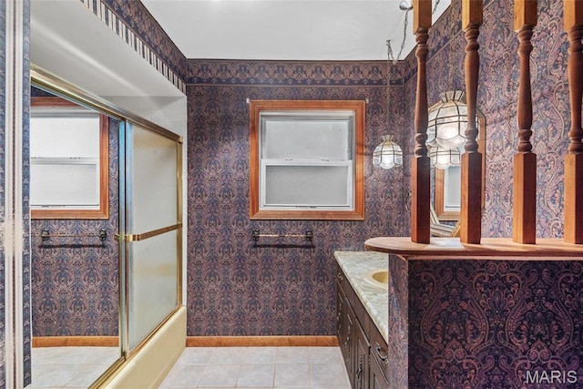 148 N Nebraska St, Marine, IL 62061 - bathroom featuring vanity, tile patterned floors, wallpapered walls, baseboards, and shower / bath combination with glass door