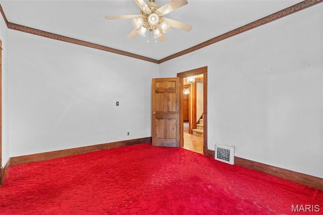 148 N Nebraska St, Marine, IL 62061 - carpeted empty room featuring a ceiling fan, baseboards, and ornamental molding