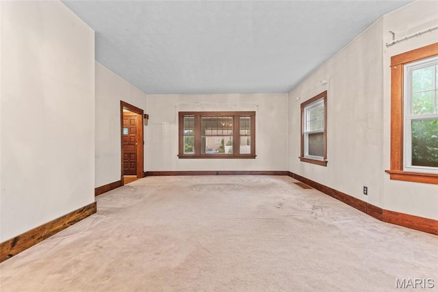 148 N Nebraska St, Marine, IL 62061 - carpeted empty room with baseboards