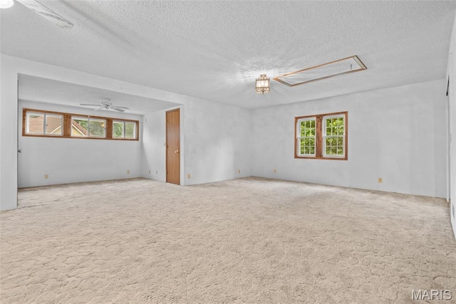 148 N Nebraska St, Marine, IL 62061 - empty room with attic access, carpet, and a textured ceiling