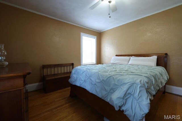 7530 Forest View Dr, Pasadena Park, MO 63121 - bedroom with wood finished floors, ornamental molding, a ceiling fan, and a textured wall
