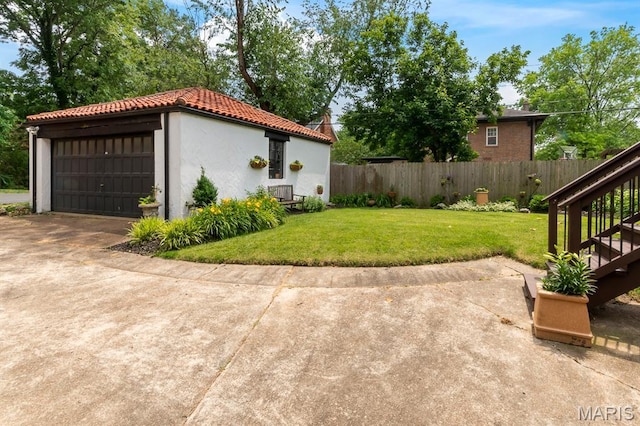 7428 Wellington Way, Clayton, MO 63105 - view of yard featuring stairs and a garage