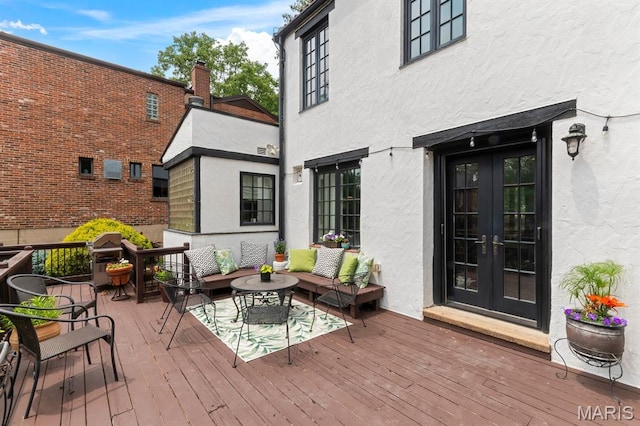 7428 Wellington Way, Clayton, MO 63105 - wooden deck with french doors, an outdoor living space, and grilling area