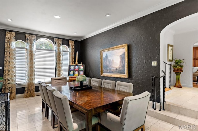 7428 Wellington Way, Clayton, MO 63105 - dining area with arched walkways, light tile patterned floors, crown molding, baseboards, and recessed lighting