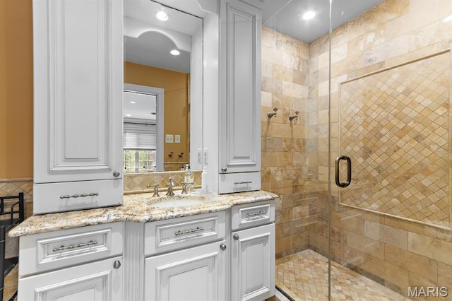 7428 Wellington Way, Clayton, MO 63105 - bathroom featuring vanity and a stall shower