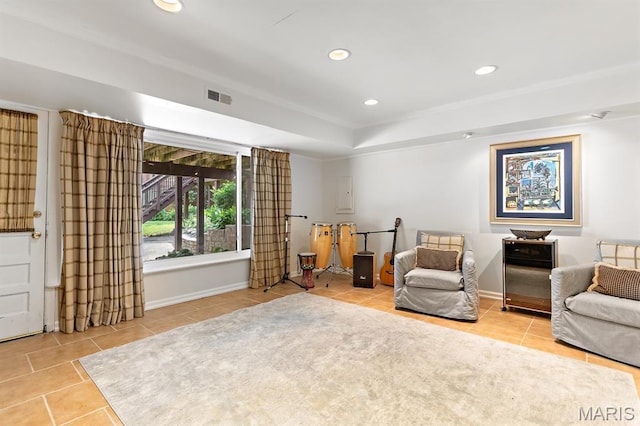 7428 Wellington Way, Clayton, MO 63105 - living area featuring tile patterned floors, recessed lighting, crown molding, a raised ceiling, and baseboards