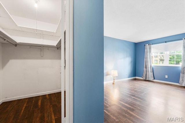 3159 Carefree Ln Unit B, Florissant, MO 63033 - walk in closet featuring wood finished floors