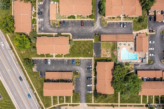 3159 Carefree Ln Unit B, Florissant, MO 63033 - drone / aerial view of a pool and a major roadway
