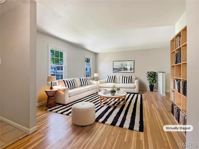 313 Pralle Ln, Saint Charles, MO 63303 - living area with wood finished floors and baseboards
