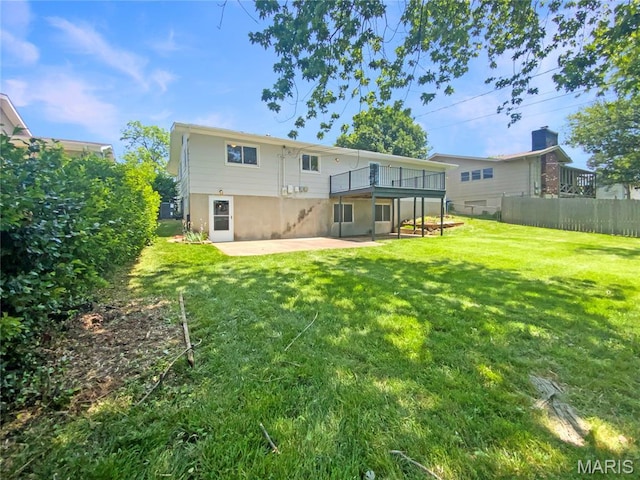 313 Pralle Ln, Saint Charles, MO 63303 - rear view of property featuring a patio area and a wooden deck