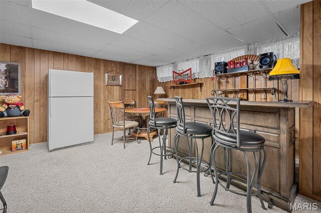 1615 Rosewall Dr Unit C, Saint Charles, MO 63303 - indoor dry bar with freestanding refrigerator, a paneled ceiling, carpet, and wood walls