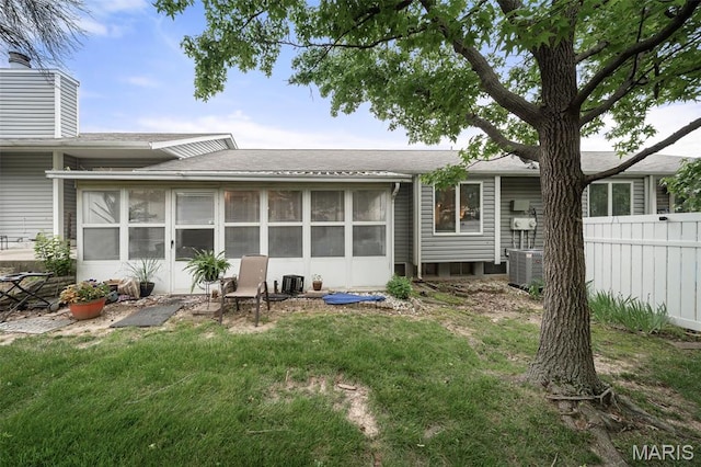 1615 Rosewall Dr Unit C, Saint Charles, MO 63303 - rear view of property featuring a sunroom and a shingled roof