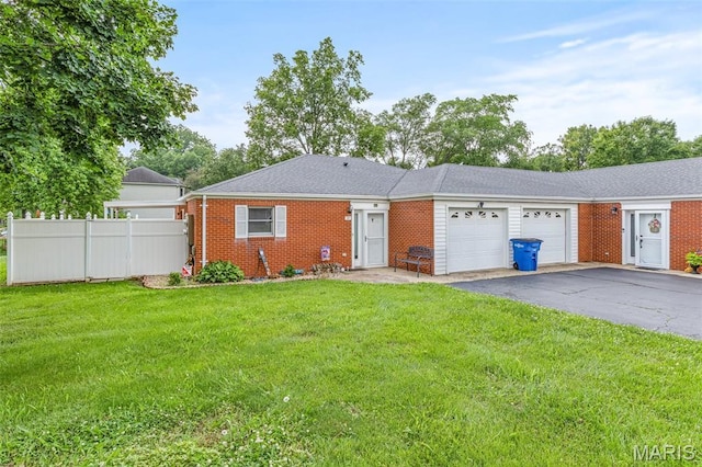 1121 N Desloge Dr Unit J-2, Desloge, MO 63601 - view of front of property with an attached garage, brick siding, and driveway