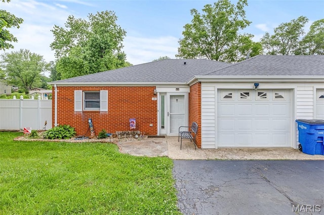 1121 N Desloge Dr Unit J-2, Desloge, MO 63601 - single story home featuring asphalt driveway, an attached garage, brick siding, and a shingled roof