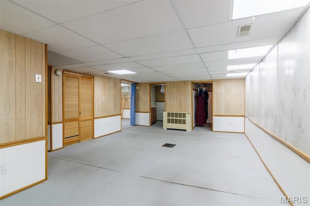607 9th St, Highland, IL 62249 - finished basement with wood walls and a drop ceiling