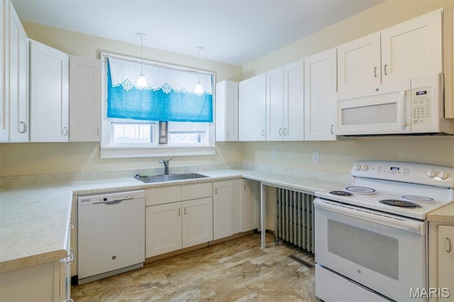 607 9th St, Highland, IL 62249 - kitchen featuring white appliances, a sink, white cabinets, and light countertops