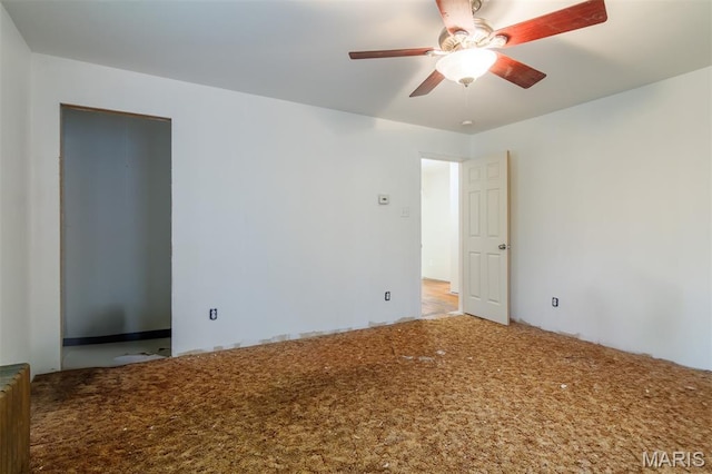 607 9th St, Highland, IL 62249 - carpeted empty room with ceiling fan